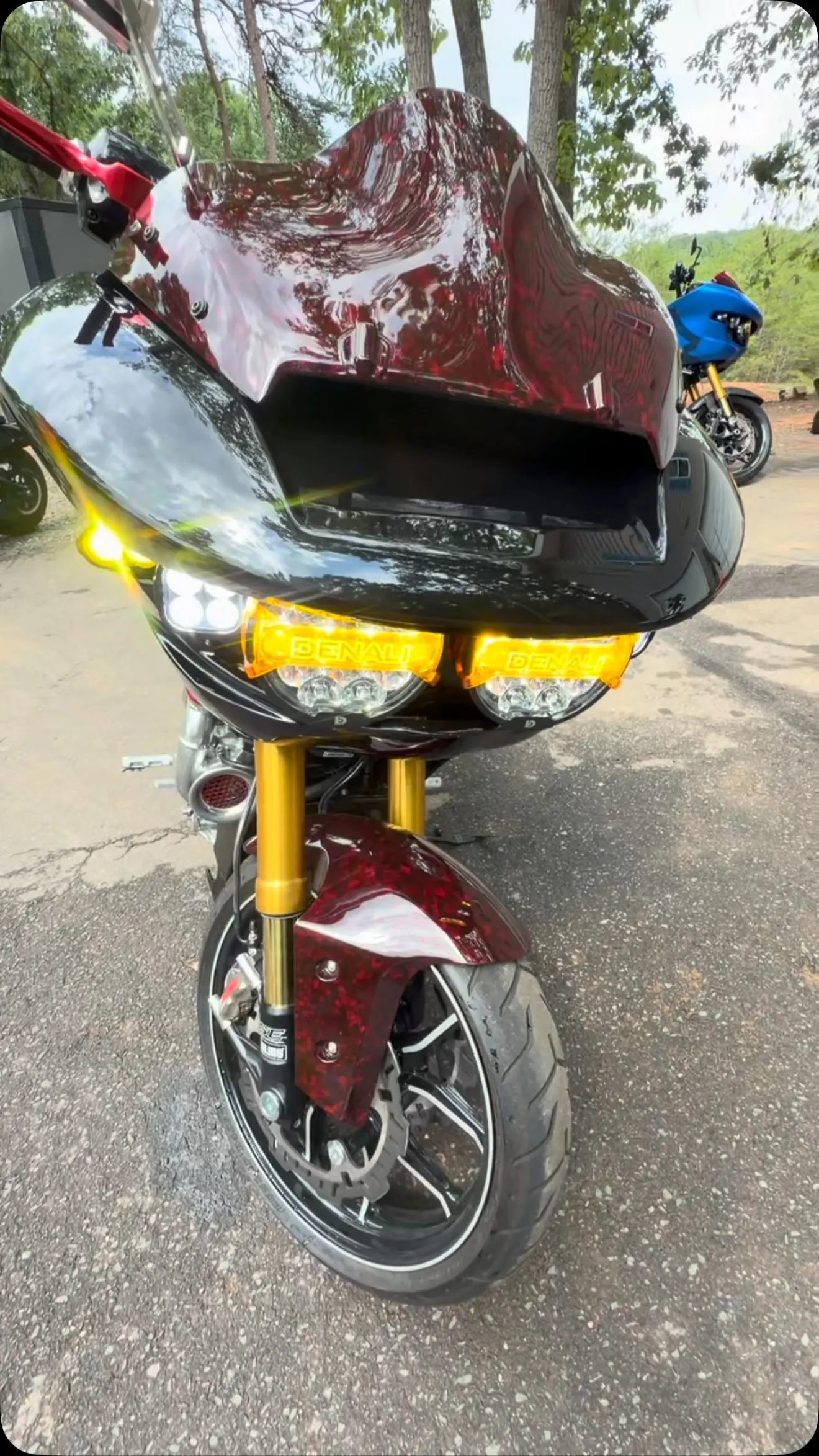 Front of Mike's turbo 2025 Harley Road Glide CVO ST in deep candy red